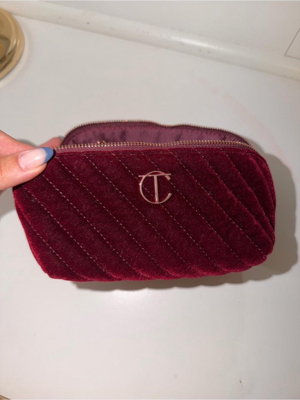 Charlotte Tilbury Deep Burgundy Quilted Velvet Cosmetic Pouch with Gold Logo
